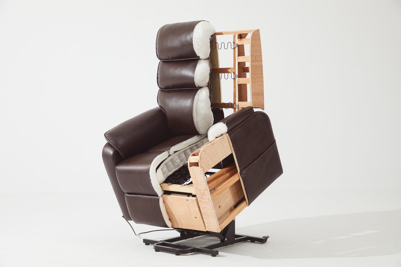 Cutaway of a CJSmart power lift recliner showing the hardwood frame, serpentine springs, foam padding and steel lift mechanism